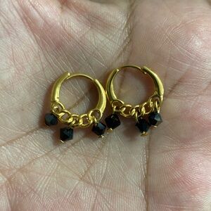 Gold plated earrings with black stones
